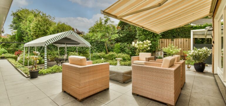 powerful patio with sitting area and small garden